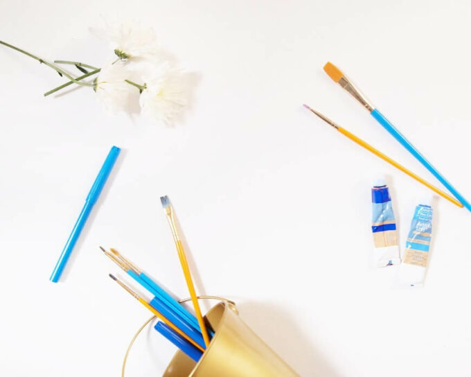 paintbrushes and paint tubes