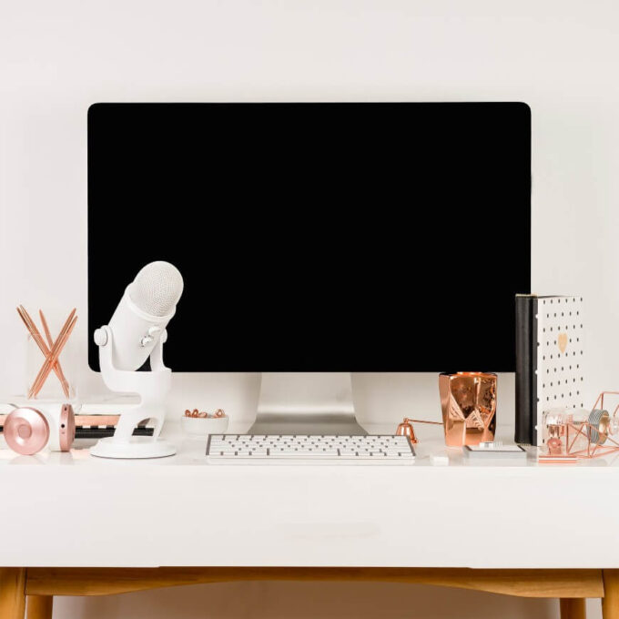imac and microphone on desk