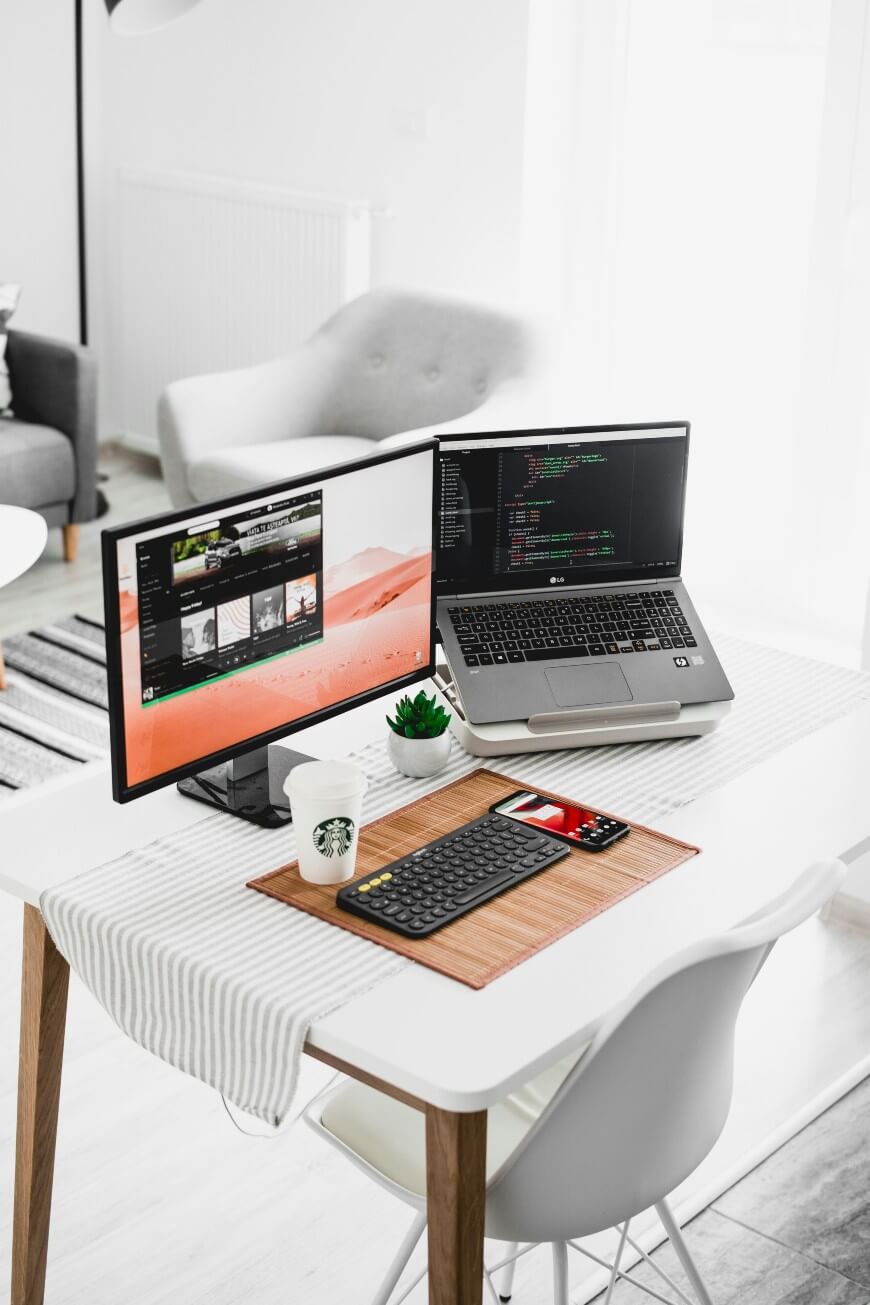 white desk with computers